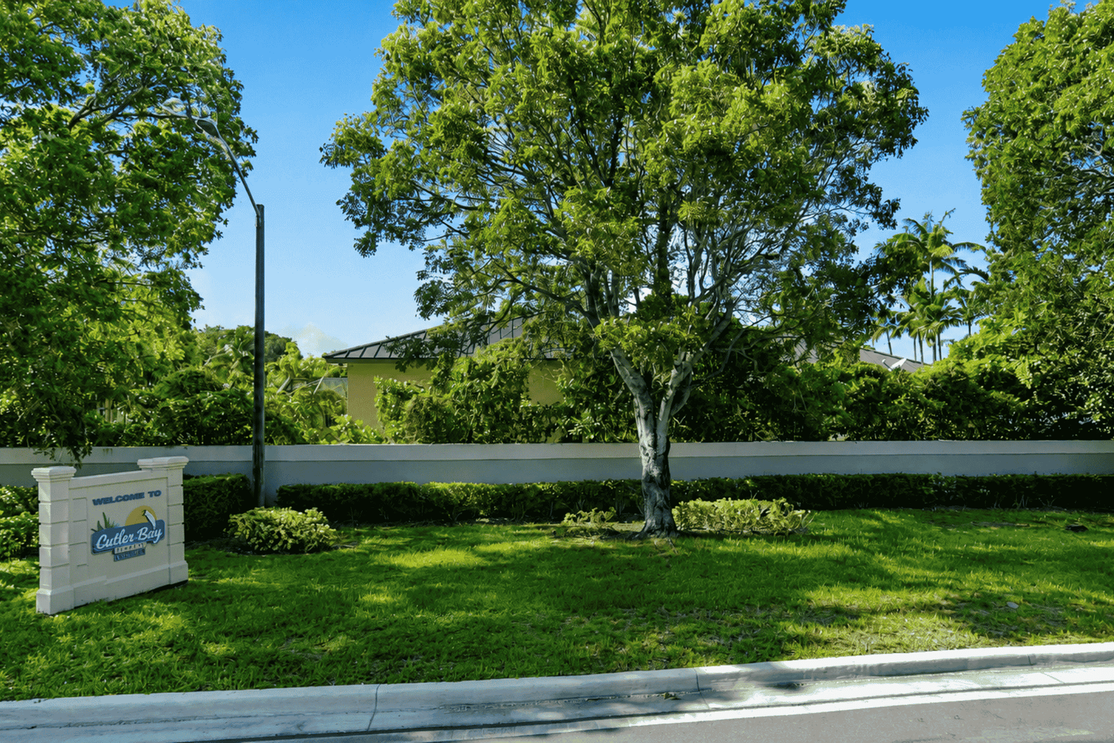 Cutler Bay home value: gated community entrance sign, HOA neighborhood 2026